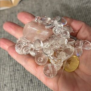Assorted Clear and Yellow Gemstones and a piece of rose quartz polished